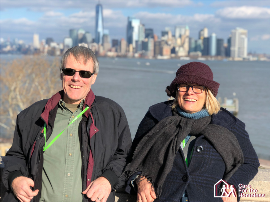 Mark and Candace in front of the skyline